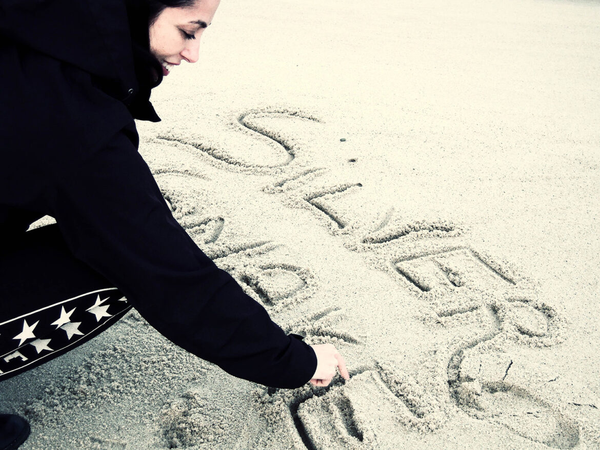 Silversnake Michelle write in sand